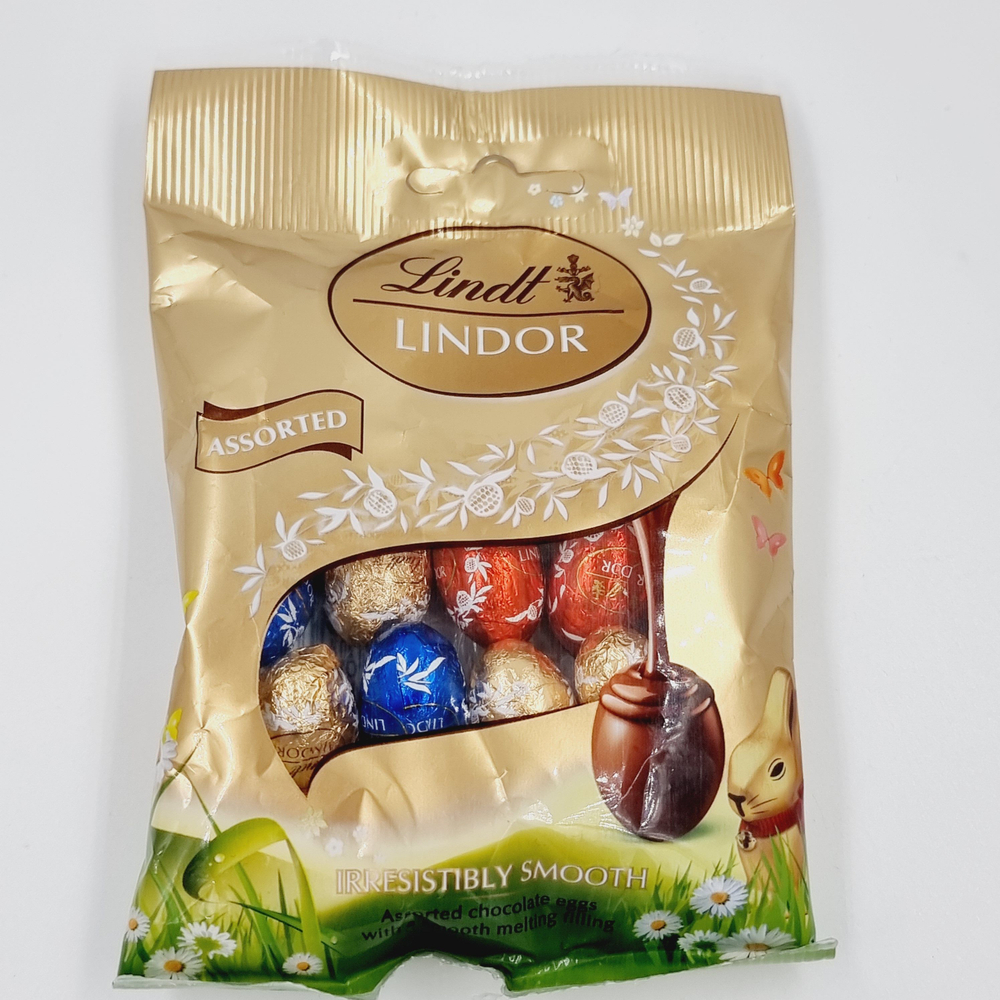 Шоколад Lindt Lindor mini eggs ассорти начинка из молочно-белого темного шоколада пасхальные яйца 90 г (Из Финляндии)