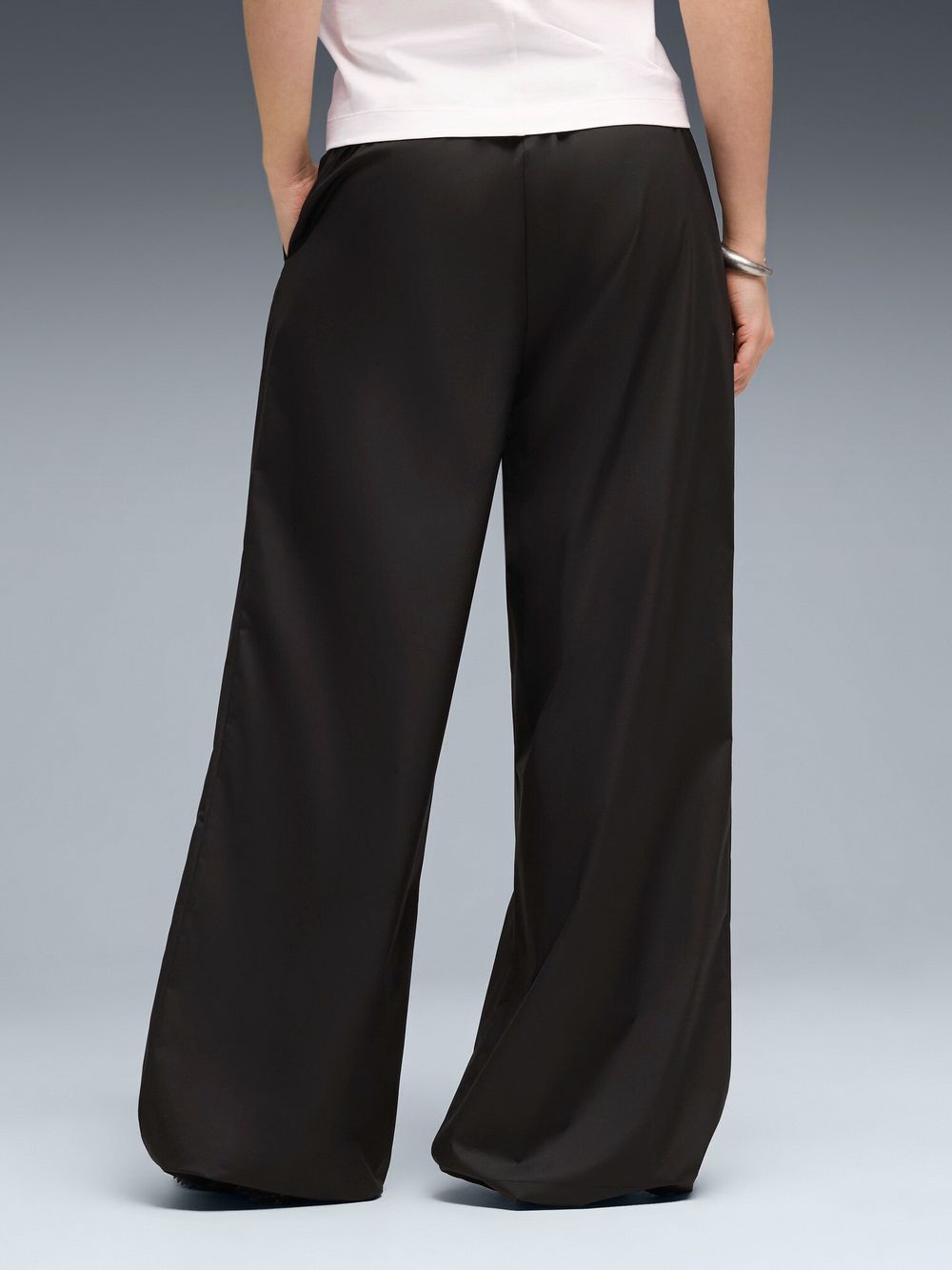 Брюки спортивные женские PUMA PUMATECH SENSE 2-Way Stretch Relaxed Windcell Woven Pants