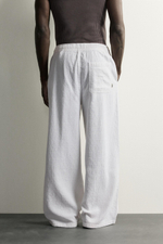 БРЮКИ RELAXED FIT ИЗ ЖАККАРДА С ЭФФЕКТОМ ПОТЕРТОСТИ — ZARA