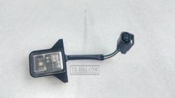 33720-K0W-N01. LIGHT ASSY., LICENSE. HONDA