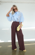 Брюки с защипами из струящейся ткани
