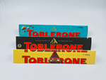 Toblerone трио темный+молочный шоколад, мед, нуга, соленая карамель (3х100 г) 300 г (Швейцария)