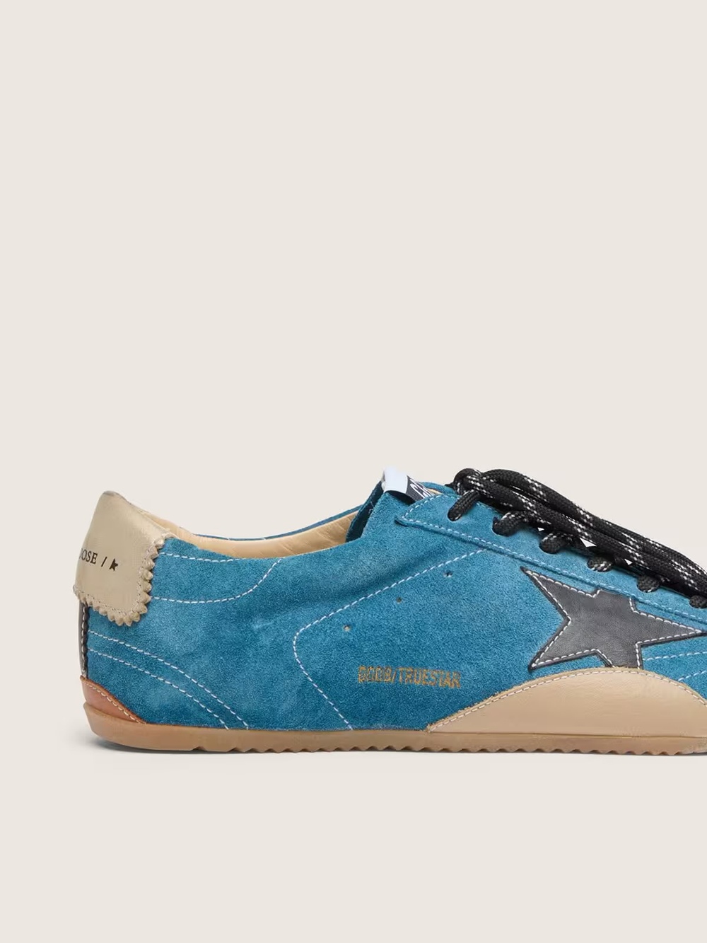 True Star of suede in steel blue with black star and cream heel tab