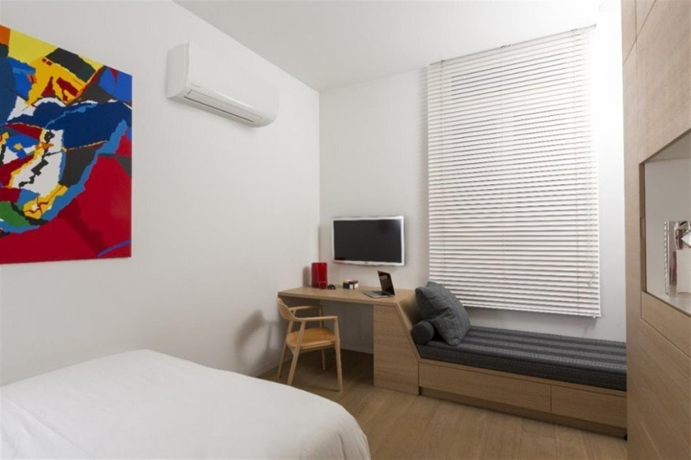 Сплит-система кондиционер настенный Daikin FTXT-E FTXF25E/RXF25E на 25 м²
