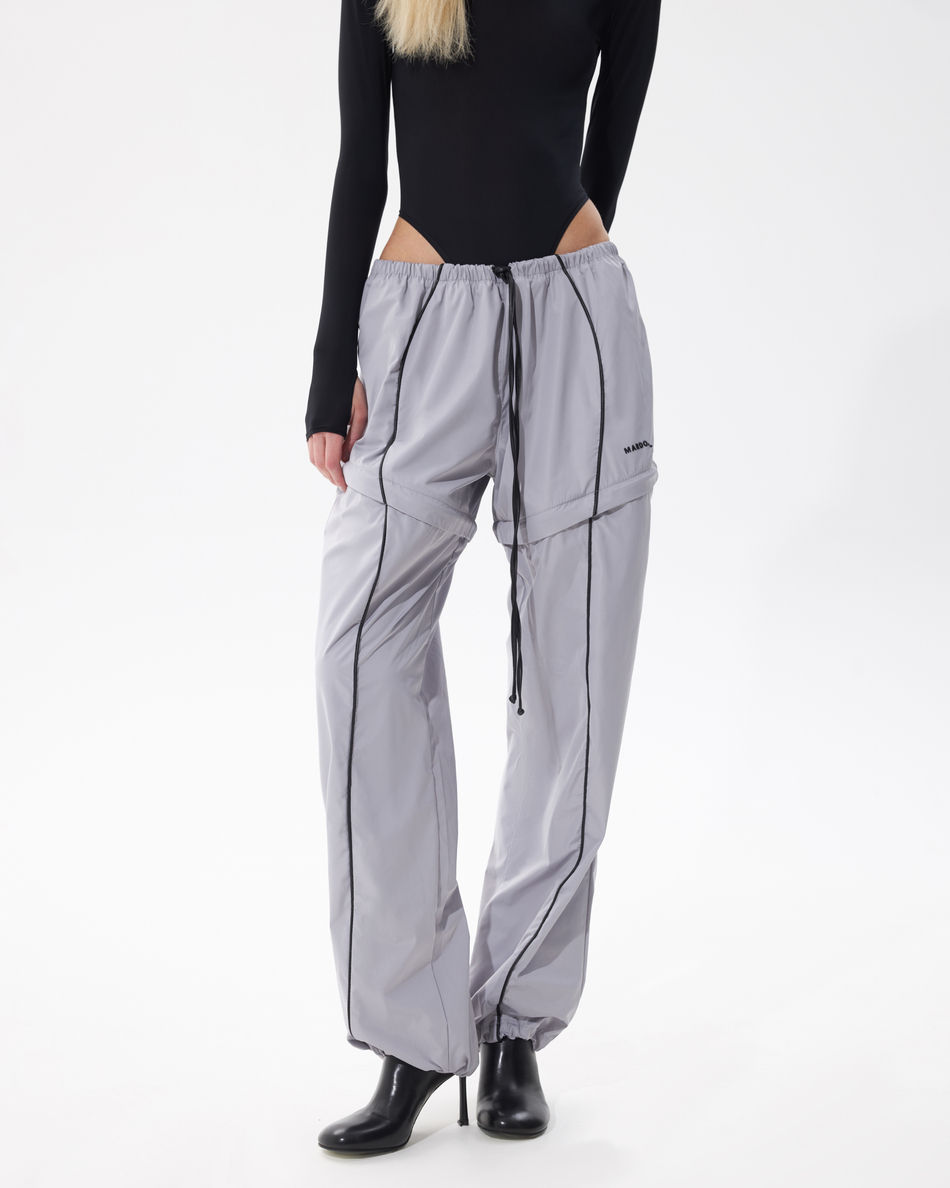 GREY TRANSFORMING  TRACKPANTS