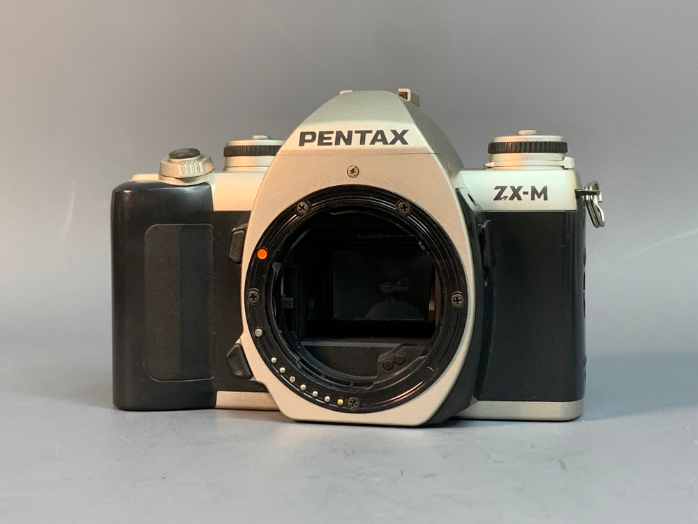 Pentax ZX-M Неисправный