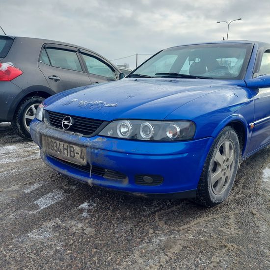 Передние фары Opel Vectra B angel eyes black