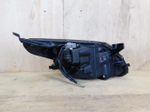фара левая Toyota Ist NCP110 52-175