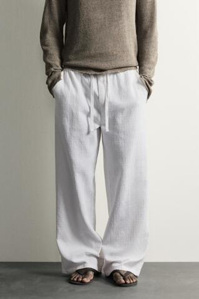 БРЮКИ RELAXED FIT ИЗ ЖАККАРДА С ЭФФЕКТОМ ПОТЕРТОСТИ — ZARA