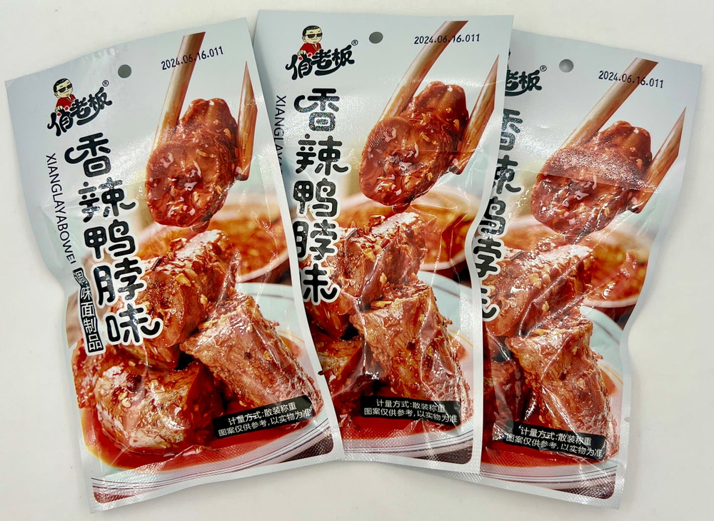 Мясо соевое утиная шея с пряностями XIANGLAYABOWEI  22г*30шт (14бл) Китай