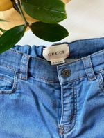 Джинсы Gucci, 92