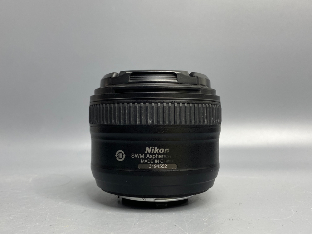 Nikon 50mm 1.8G пылинки