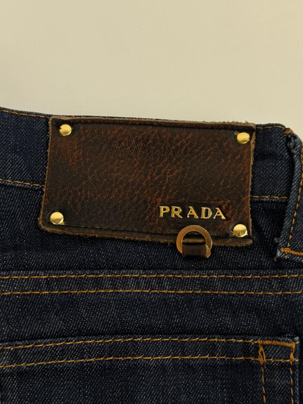 Джинсы Prada