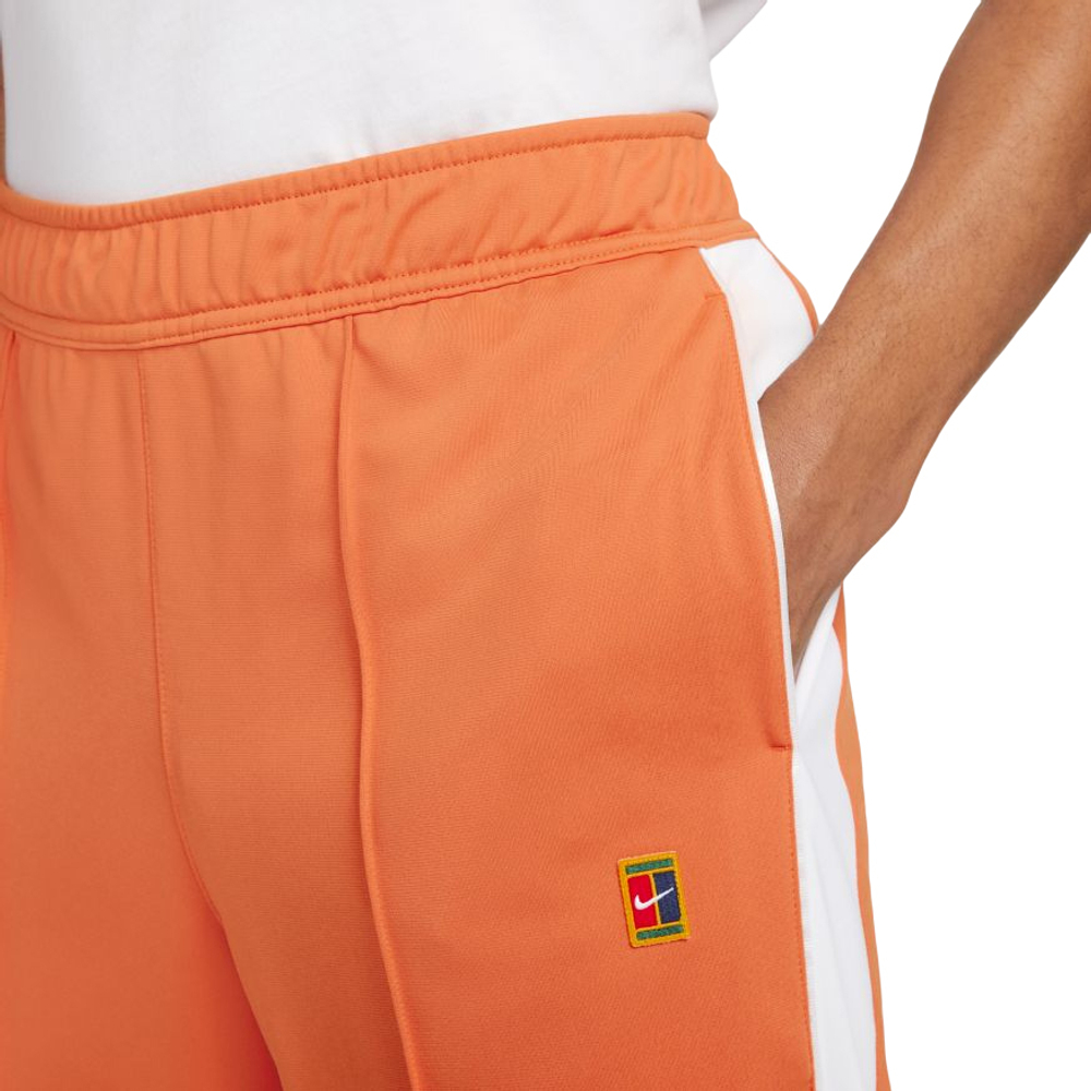 Мужские теннисные штаны Nike Court Heritage Suit Pant M - желтый