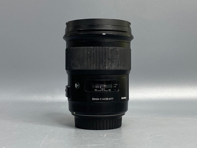 Sigma AF 50mm 1.4 DG HSM Art Canon EF царапки на линзе