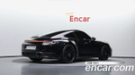 Porsche 911 Carrera 4 GTS — 2024