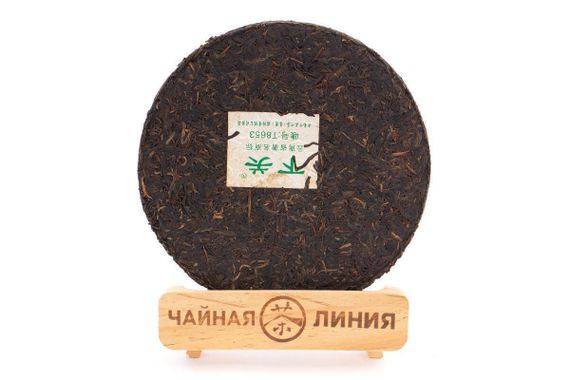 Шэн пуэр 2013 г. «T8653» марки «Сосна и журавль» завода «Сягуань» блин 357 г