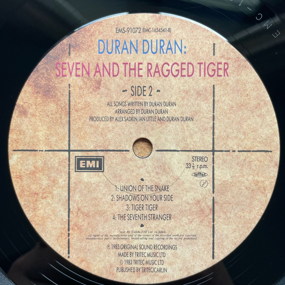 Винтажная виниловая пластинка LP Duran Duran Seven And The Ragged Tiger (Япония 1983) (Оби)