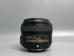 Nikon 50mm 1.8G пылинки