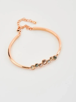 Жесткий браслет Эльза с камнями Swarovski шампань