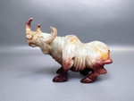 Фигура носорога из камня