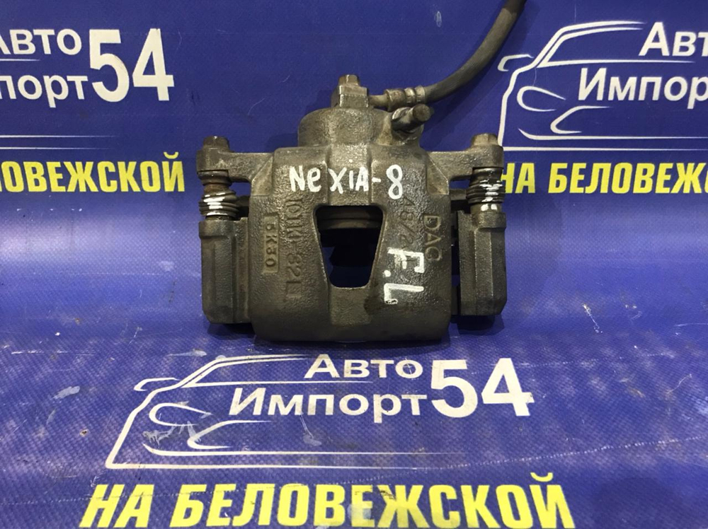 Суппорт тормозной передний левый DAEWOO NEXIA 2006