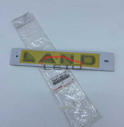 Шильдик "LAND" на крышку багажника (чёрный GR Sport) 75441-60710 7544160710
