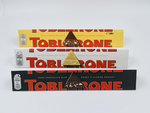Toblerone трио темный+белый+молочный шоколад, мед и нуга (3х100 г) 300 г (Швейцария)