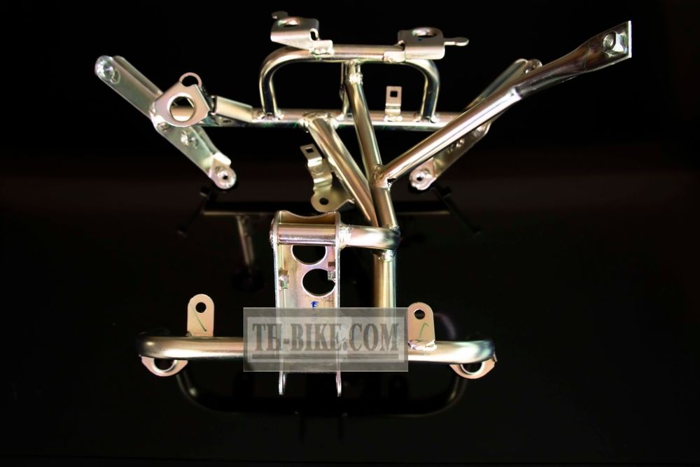 50310-KWN-930 (50310-KWN-640). STAY, FR. COVER. Headlight Stay. Honda PCX125 1 gen.
