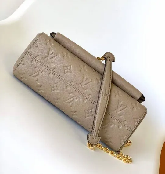 Сумка Louis Vuitton Vavin PM бежевый