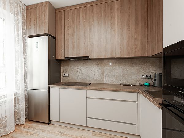 Угловая минималистичная кухня в ЖК «Яблоневый Сад» Угловая минималистичная кухня в ЖК «Яблоневый Сад»