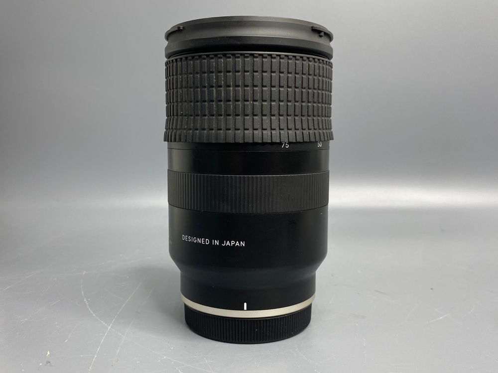 Tamron 28-75mm 2.8 Di III RXD Sony E Пылинки