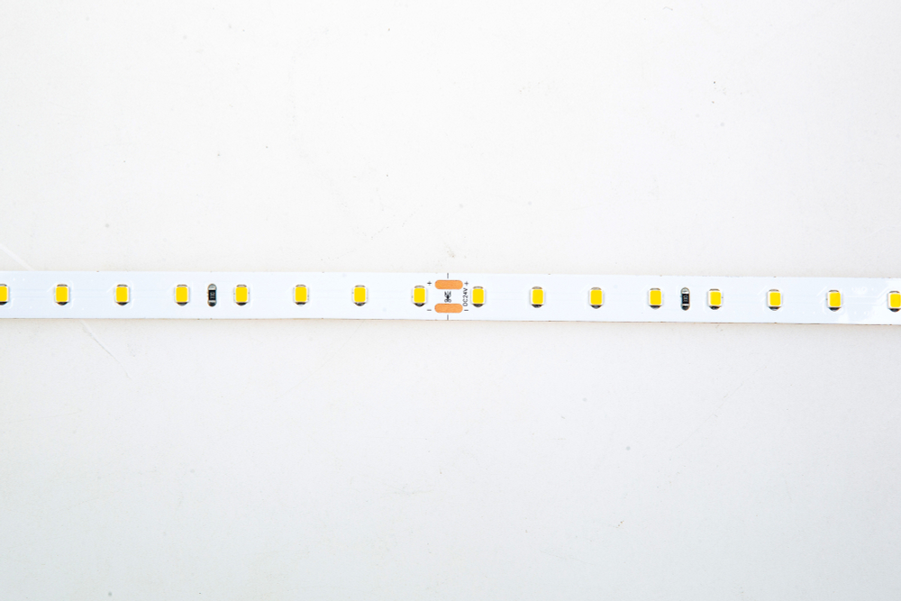 Лента светодиодная SMD тёпло-белая DC24V 12W/m 3000K 1842Lm/m 80д/м CRI>85 IP20,  упаковка 5 метров,  ширина 10мм,  высота 2мм,  самоклейкая