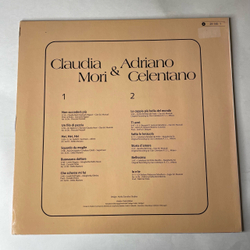 Винтажная виниловая пластинка LP Claudia Mori and Adriano Celentano, Storia D'Amore (Германия 1982) (Клубное Издание)