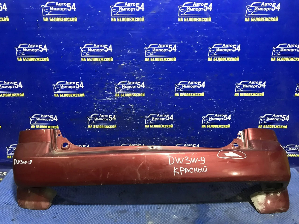 Бампер задний MAZDA DEMIO 2000