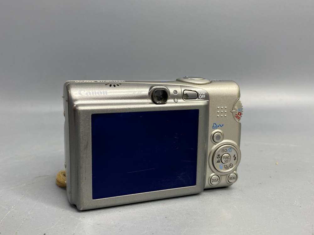 Canon Digital IXUS 950 IS, объектив шумит