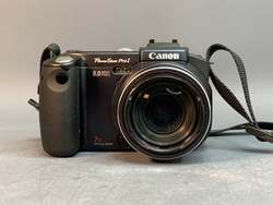 Canon PowerShot Pro1 внутри линзы пыль