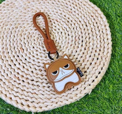 Брелок Leather cat sad, коричнево-белый