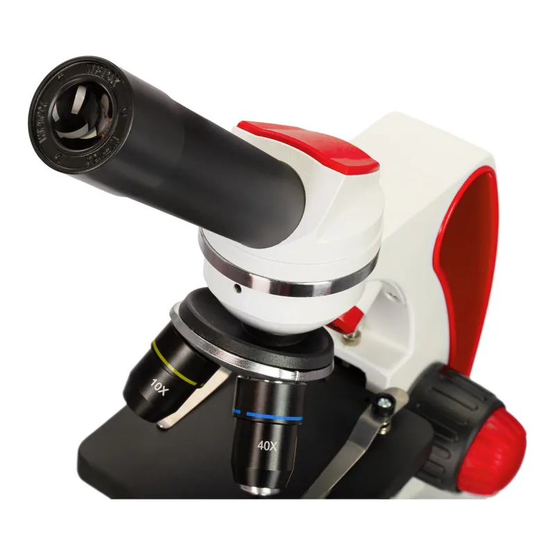 Микроскоп Levenhuk Discovery Pico Terra с книгой - крупный план окуляра и револьверной головки