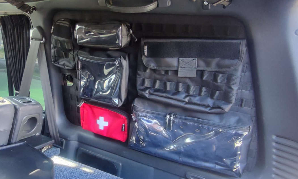 Панель MOLLE на стекло багажника Mitsubishi Pajero 2 Левая