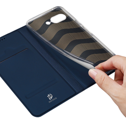 Чехол книжка из PU кожи синего цвета от Dux Ducis для Google Pixel 9a, серия Skin Pro Series Case