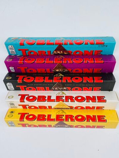 Toblerone ассорти из 5 видов темный+белый+молочный шоколад, мед, нуга, соленая карамель, изюм (6х100 г) 600 г (Швейцария)