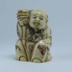 Нэцкэ Монах с корзиной рыбы