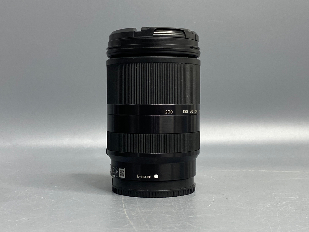 Sony 18-200mm f/3.5-6.3 E LE точки под передней линзе