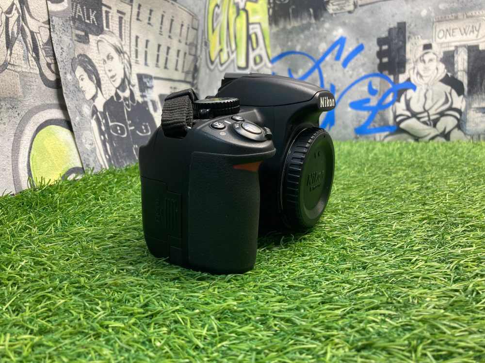 Nikon D3100 8.950 кадров