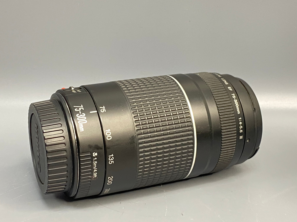 Canon 75-300mm 4-5.6 III Царапины на линзе