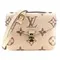 Сумка LOUIS VUITTON Pochette Métis с крупным тисненым узором