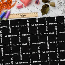Ткань дюспо стильная клетка из белых надписей на чёрном фоне