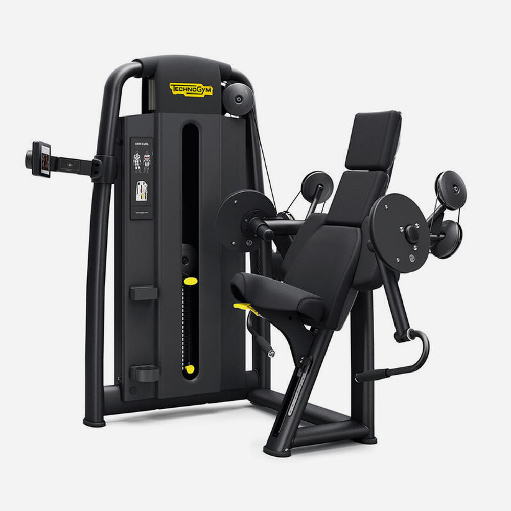 Бицепс тренажер Technogym ARM CURL