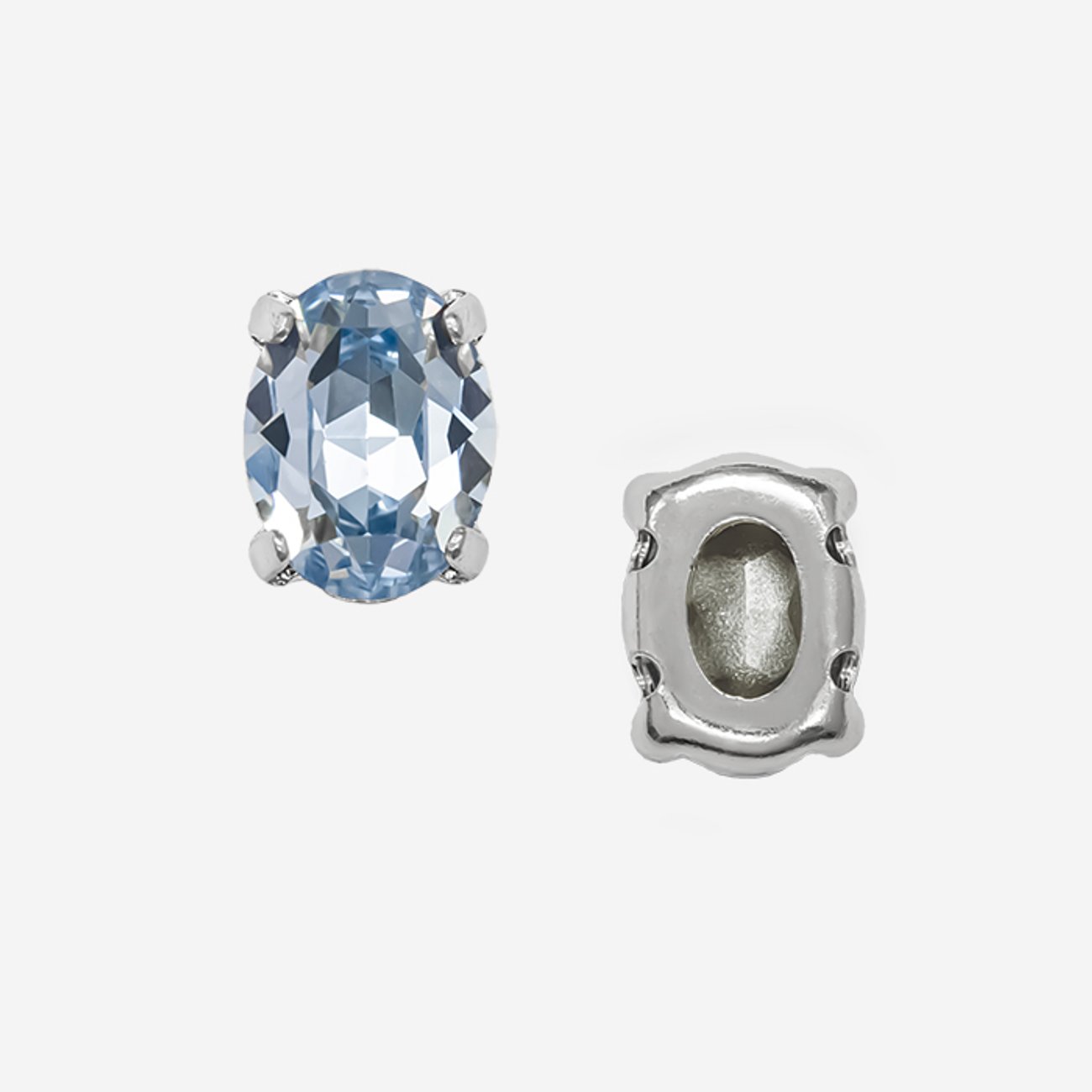 Кристалл Овал (Oval Fancy Stone) в цапах, оттенок "Светлый Сапфир"/"Light Sapphire", 8*6мм, родирование